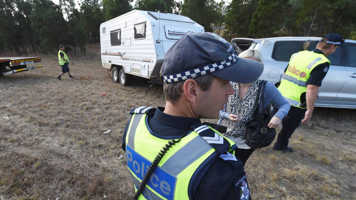 Leading Senior constable Selwyn Quaill at a caravan rollover on Tuesday. Picture: Lachlan Bence