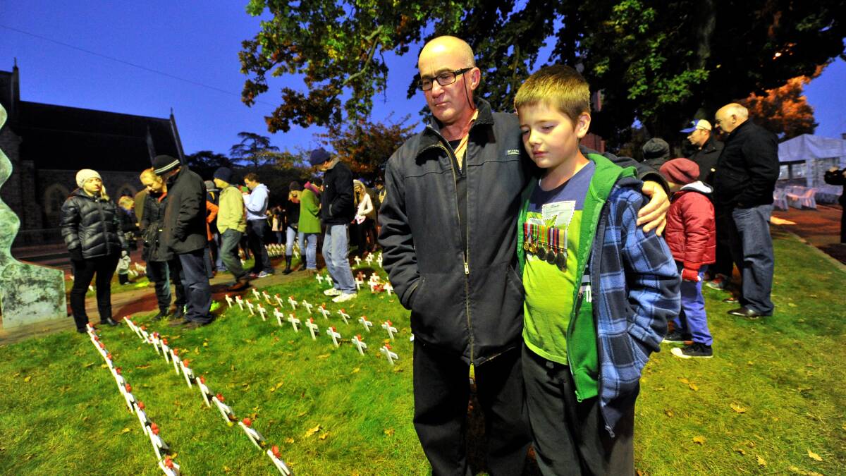 Gary and Matthew Greville at the dawn service. PICTURE: JEREMY BANNISTER