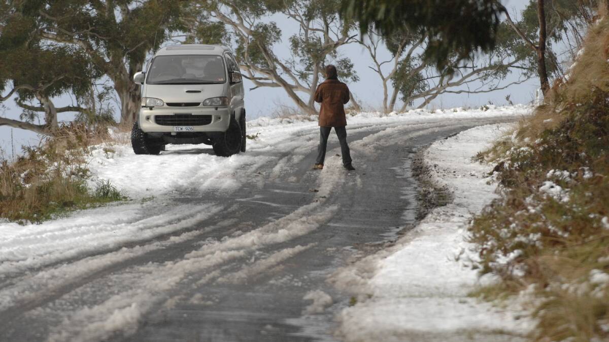 Plenty of people were enjoying the snow up at Mt Buninyong in 2008. PICTURE: LACHLAN BENCE
