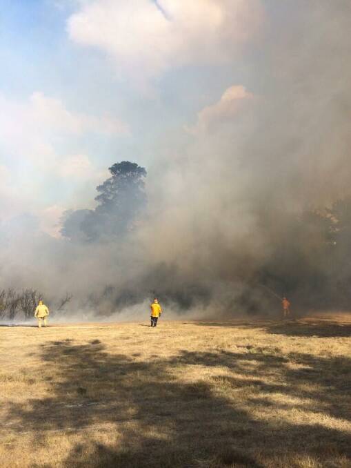 Photo of fire crews working hard to get on top of the fire. Picture: Matt Dixon