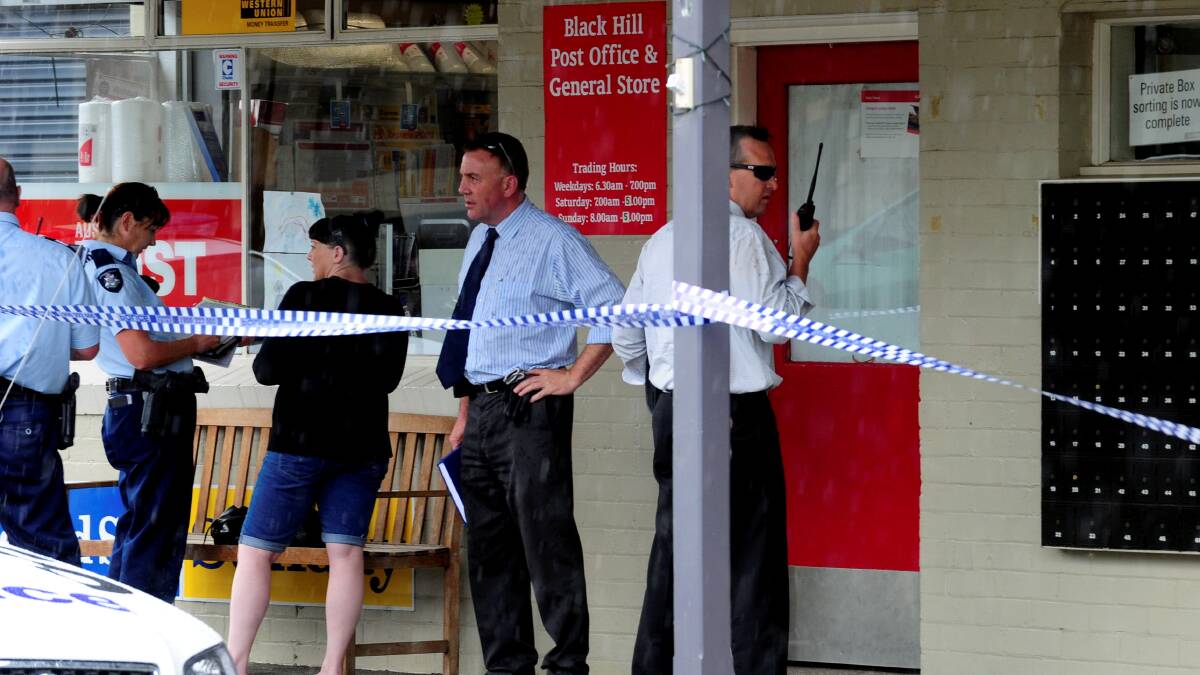 Police at the scene minutes after the armed robbery. PICTURE: JEREMY BANNISTER