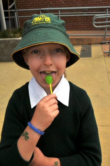 Jenna Collins and green lollipop. Picture: Jeremy Bannister