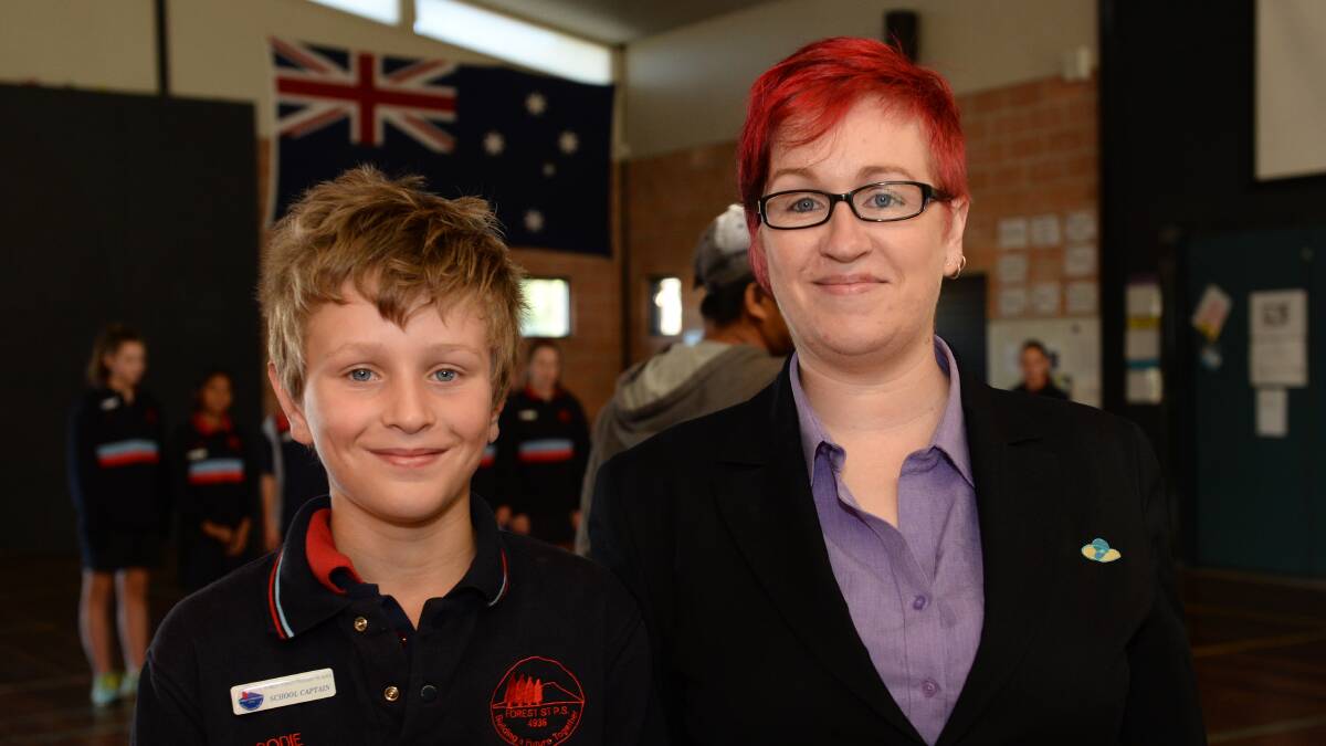 Forest St Primary School induction assembly for school and house captains.  School captain Brodie Plover with Justine Bigham. 