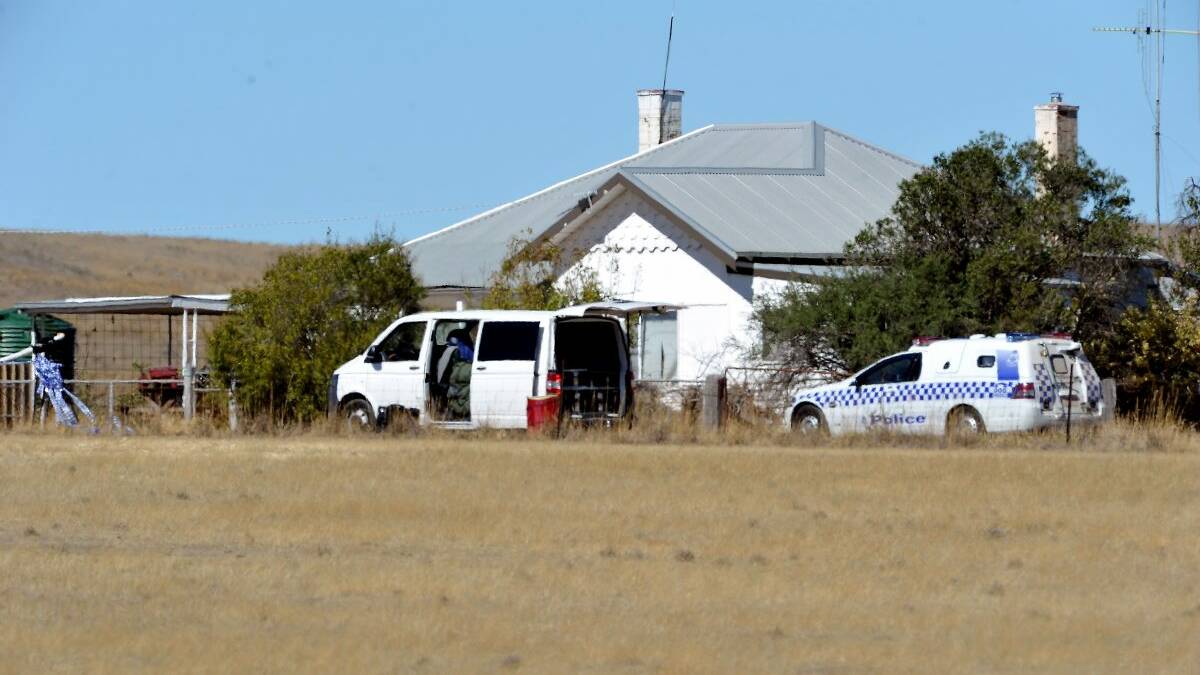 Police continue to scour the crime scene the next day. Picture: Lachlan Bence