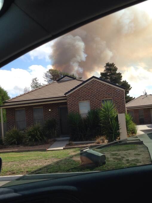 Shot of the smoke appearing close to homes. Photo: Amy Norberry