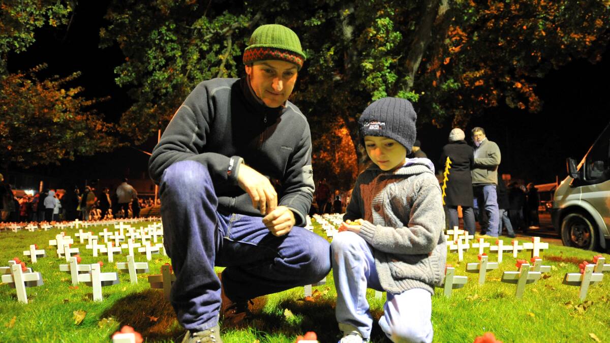 Paul and Oliver Keast at the dawn service. PICTURE: JEREMY BANNISTER