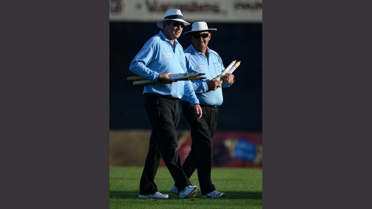 Day 3 The umpires leave the field at the end of play PIC: ADAM TRAFFORD 