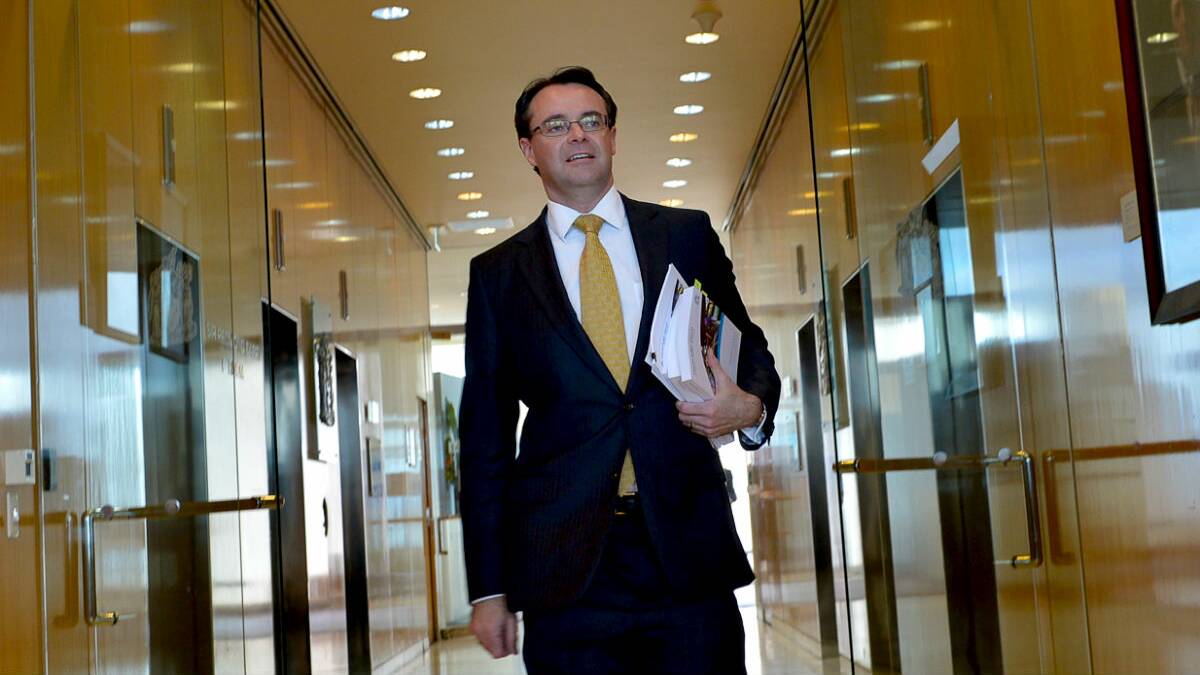 Treasurer Michael O'Brien on his way to deliver the 2014 Victorian budget. PICTURE: MICHAEL CLAYTON-JONES