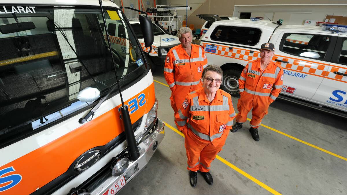 SES volunteer Heather Turner, centre, pictured with Rob Mitchell and Norm Baker. PICTURE: JUSTIN WHITELOCK