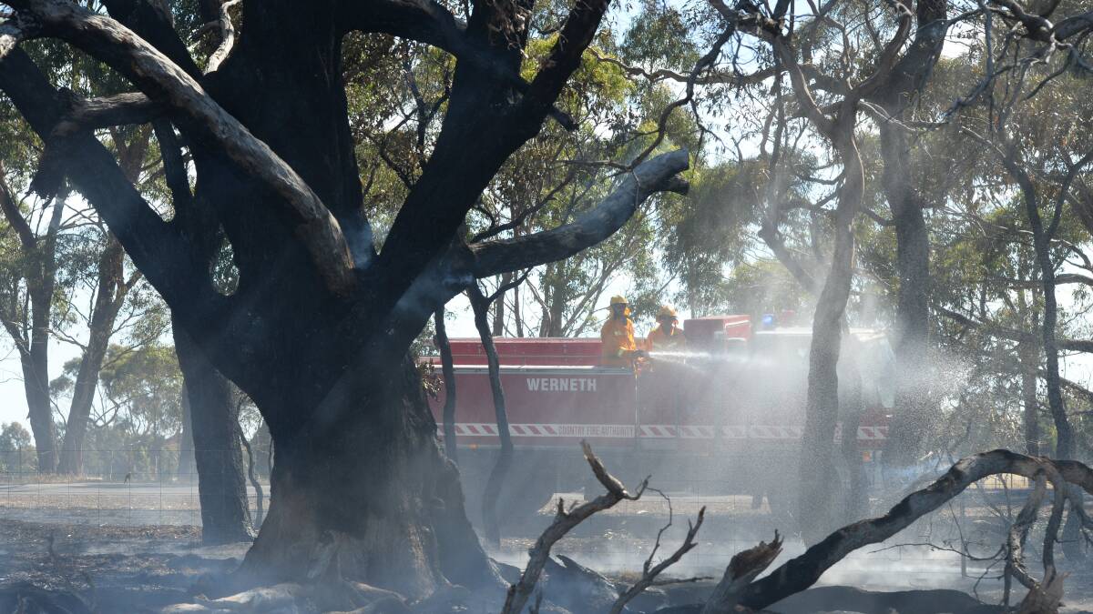 Firefighers at the scene of a blaze near Dereel on Sunday. PICTURE: KATE HEALY