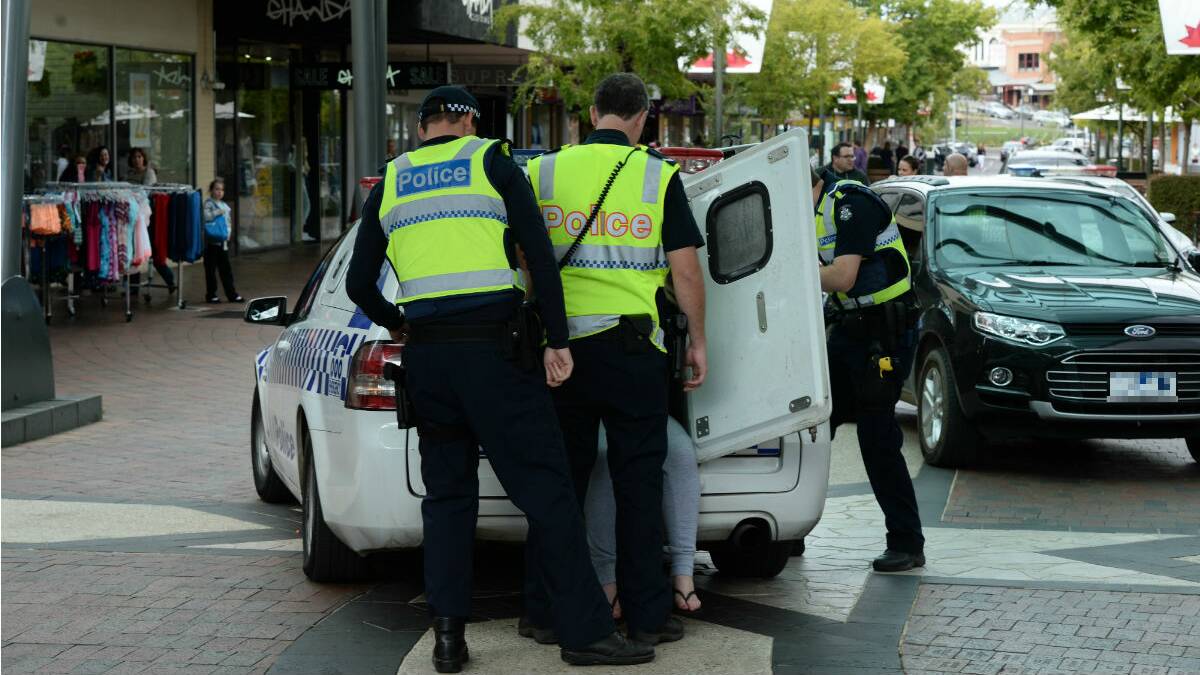 Police officers in the Bridge Mall near the scene of a knife attack this afternoon. PICTURE: ADAM TRAFFORD