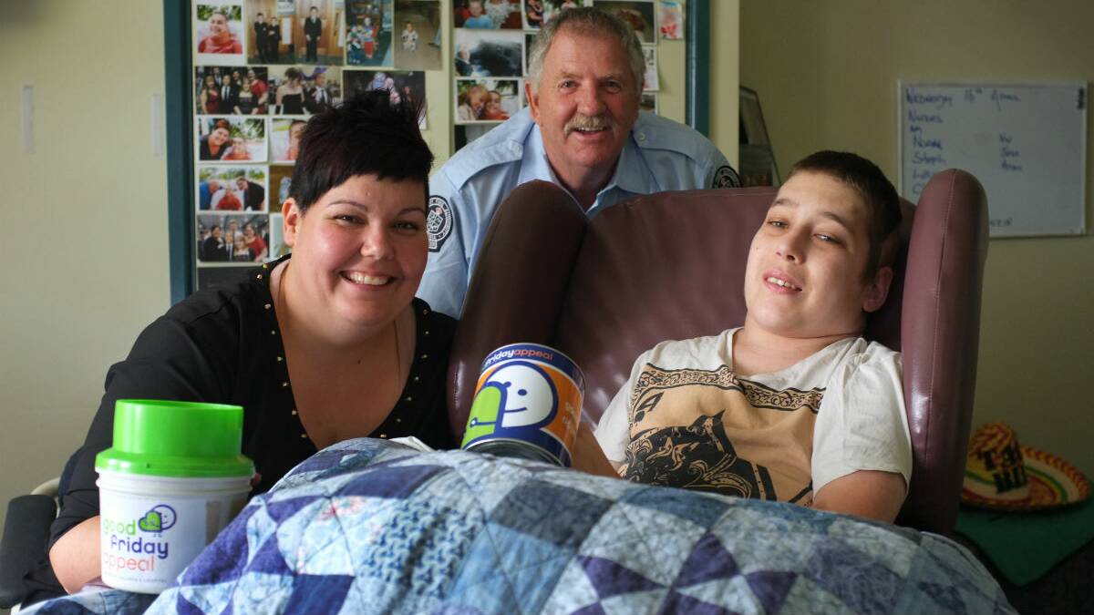 Cory Panazzo with his sister Emma Ward and Good Friday Appeal area manager Ray Trounson. PICTURE: ADAM TRAFFORD