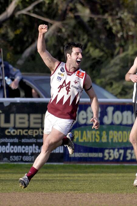 Melton’s Brad Murphy celebrates a goal during the last quarter. Murphy has been influential in getting the Bloods in a position to launch an attack at finals this year. 
