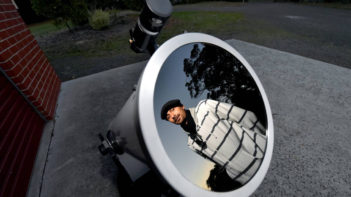 Ballarat Observatory science and education officer Saeed Salimpour prepares for Tuesday's annular eclipse of the sun. Picture: Jeremy Bannister