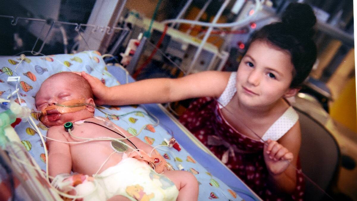 Sophia Matthews, pictured with Ezekiel at the Royal Children's Hospital. PICTURE: LACHLAN BENCE 