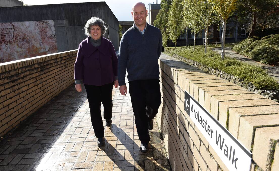 Federation University curator Clare Gervasoni and university project officer Ash Bennett take a stroll along Arblaster Walk, which was named in honour of a former SMB campus principal. PICTURE: LACHLAN BENCE