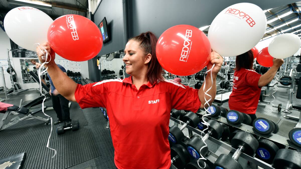 Body and Soul personal trainer Ange Simpson gets in some light weightlifting for RedFeb. PICTURE: jeremy bannister