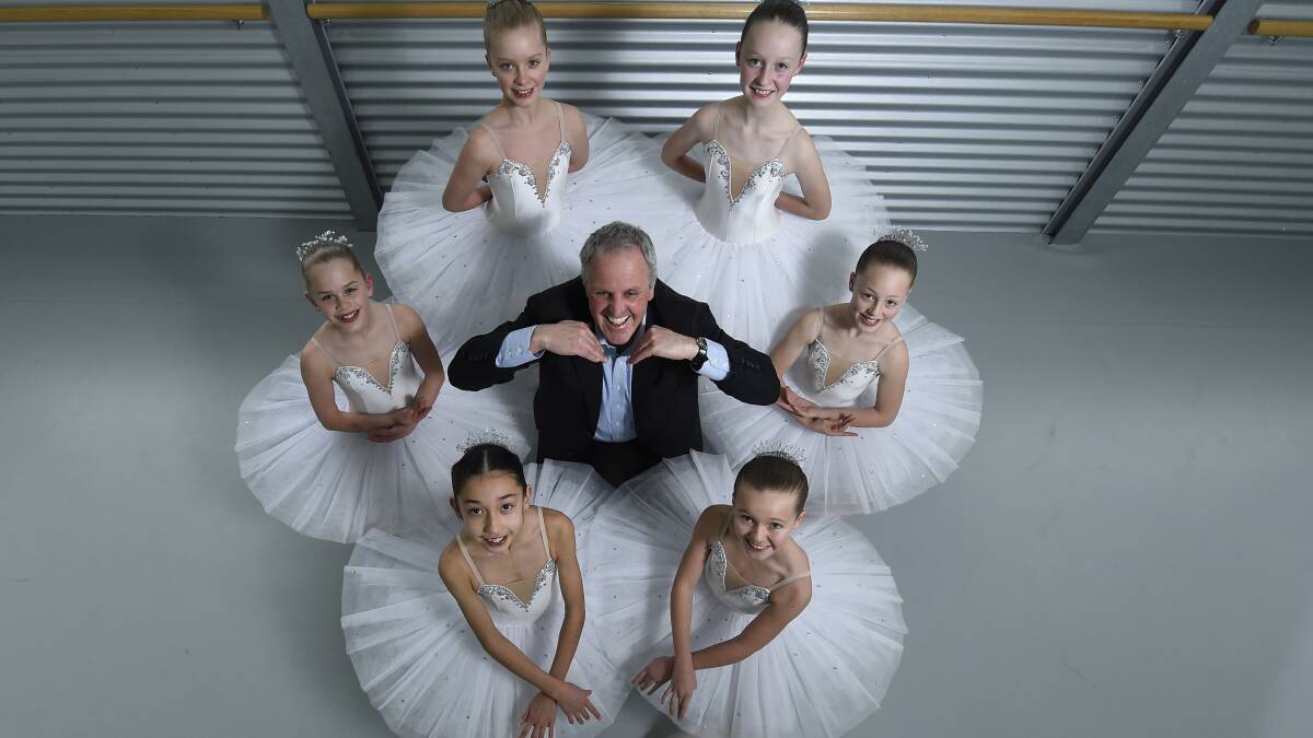 Telstra’s Bill Mundy with, from top left, Anita Coutts School of Dance students Maidie Widmer, Annaleise Davson, Ellie Sbardella, Emily Crockett, Mio Bayly and Camilla Butler. PICTURE: JUSTIN WHITELOCK