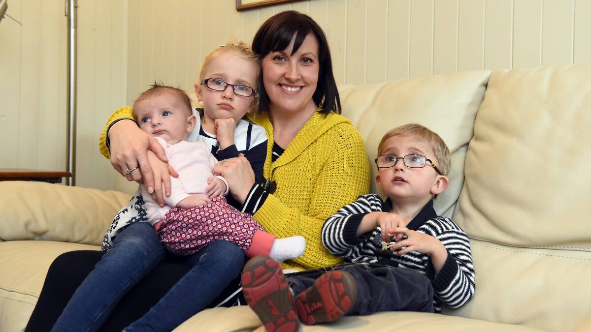 Georgie Coulson with her children Nellie, 10 weeks, Maisie, 5, and Grady, 3. PICTURE: JUSTIN WHITELOCK