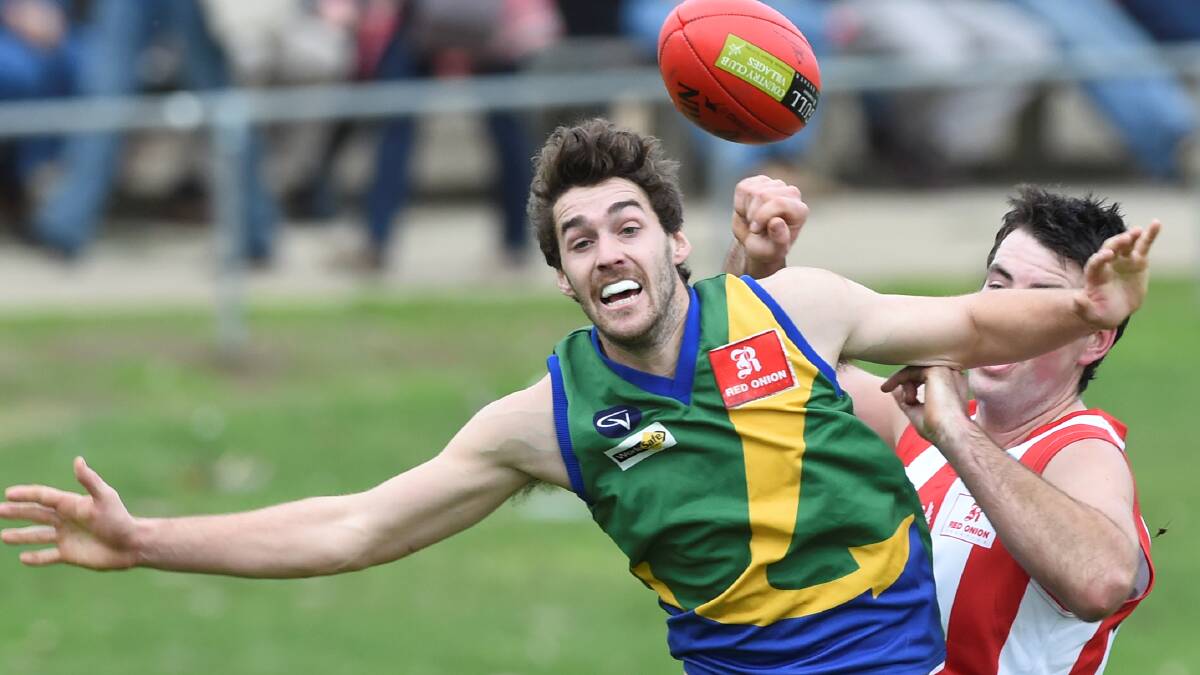Lake Wendouree’s Ben Hayes tries to mark in front of Ballarat’s Sam Conroy earlier this year.