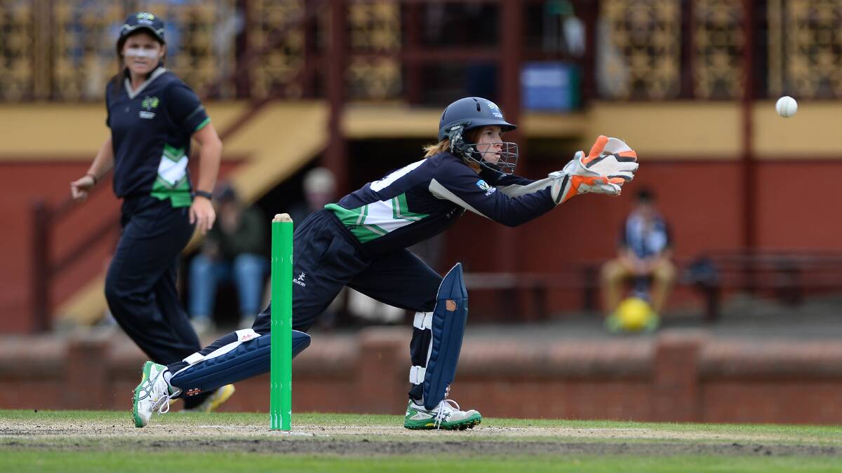 Victorian wicketkeeper Annabel Martin takes a return during the Cricket Australia Under-18 Female National Championship final against New South Wales at Eastern Oval.
PICTURE: ADAM TRAFFORD