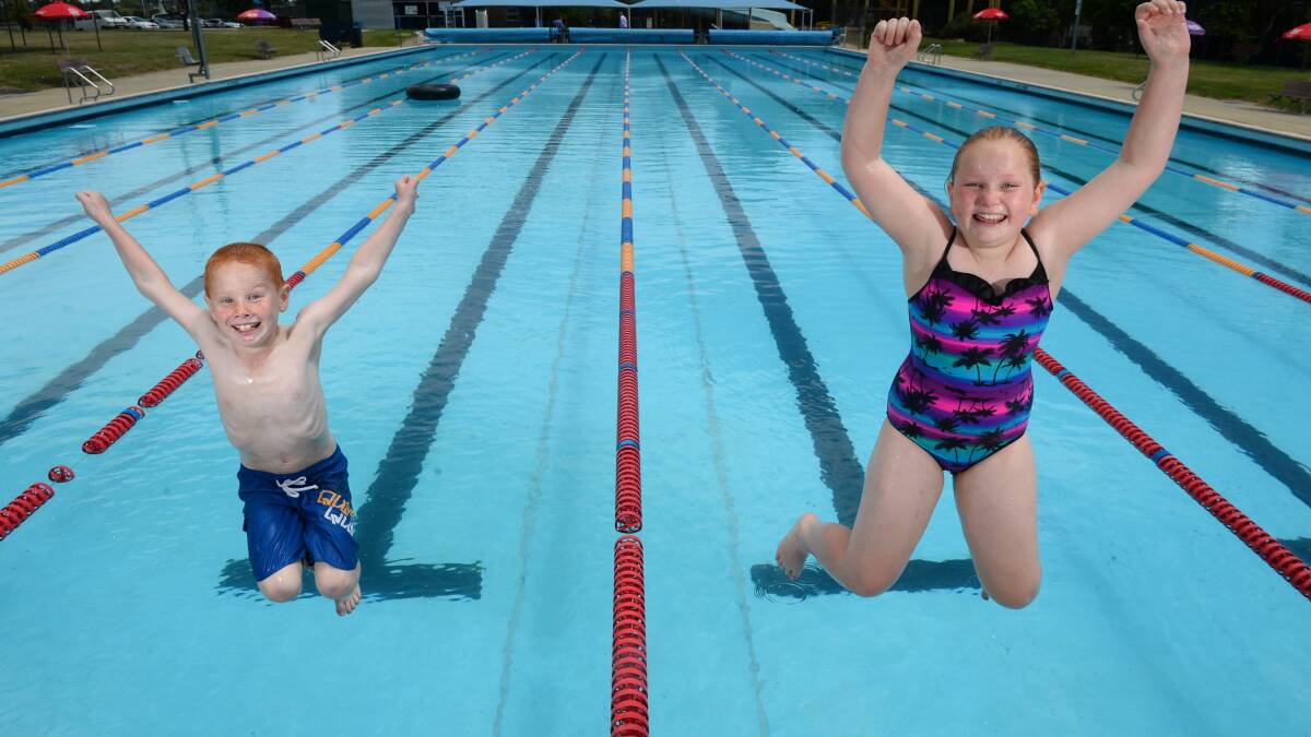 Cooper, 10, and Georgia Glenwright, 10, test out the water at the Eureka Pool. PICTURE: ADAM TRAFFORD
