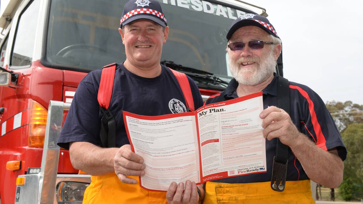 Smythesdale Fire Brigade volunteer Simon Turner and captain Alwyn Parker are getting set for the open day. Picture: KATE HEALY