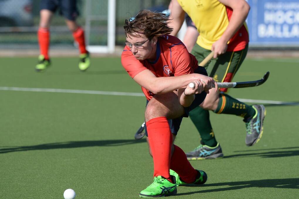 WestVic’s Max Ferrier sizes up the ball against Knox in a Hockey Victoria men’s state league two game at Ballarat’s Prince of Wales Park on Saturday. 
Picture: Kate Healy