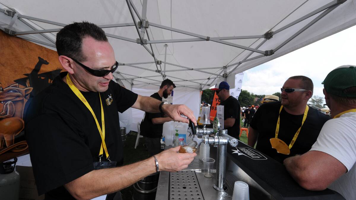  Rebellion Brewery’s Andrew Lavery pours a beer at the Ballarat Beer Festival. PICTURE: JUSTIN WHITELOCK