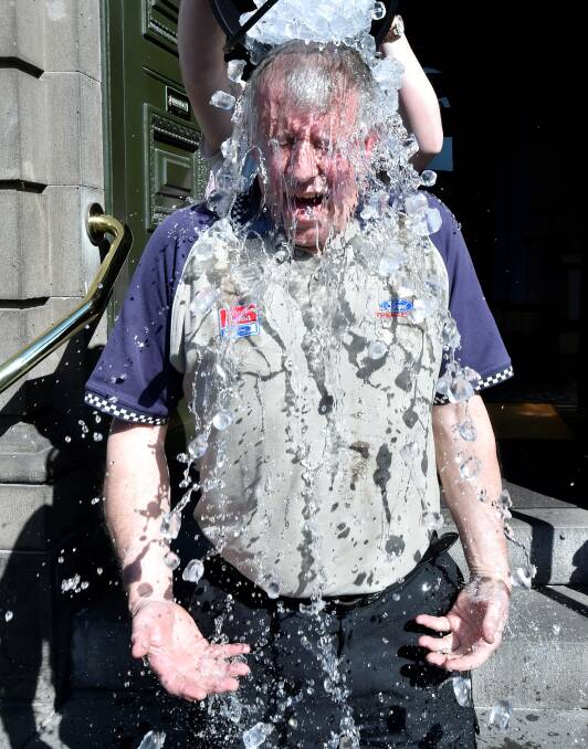Ballarat City councillor John Philips takes part in the #icebucketchallenge outside the Town Hall. PICTURES: JEREMY BANNISTER
