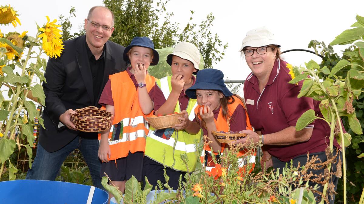The Ballarat Foundation chief executive officer Geoff Sharp with Delacombe Primary School pupils Serena Rushton, Luke Gray, Bethany Somers and acting principal Marnie Cooper. 