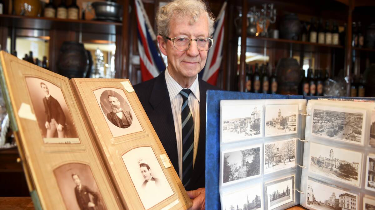 Dr John Besemeres with part of the postcard collection. PICTURE: LACHLAN BENCE