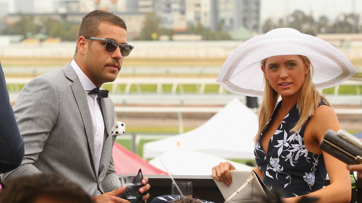  The AFL might be taking a back seat to racing during the spring carnival but there will not be any shortage of star players at the races like Lance Franklin, pictured with Jesinta Campbell. PICTURE: Getty Images