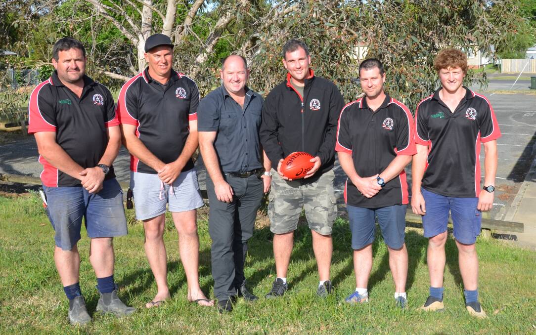 WICKERS’ LEADERS: Newly elected president Mick Alsop (third from left) and new coach Damian Lubeek  (third from right)  flanked by a new-look coaching panel featuring Geoff Hepworth, left, Aaron Braeckmans, Adrian King and Aaron Hepworth.