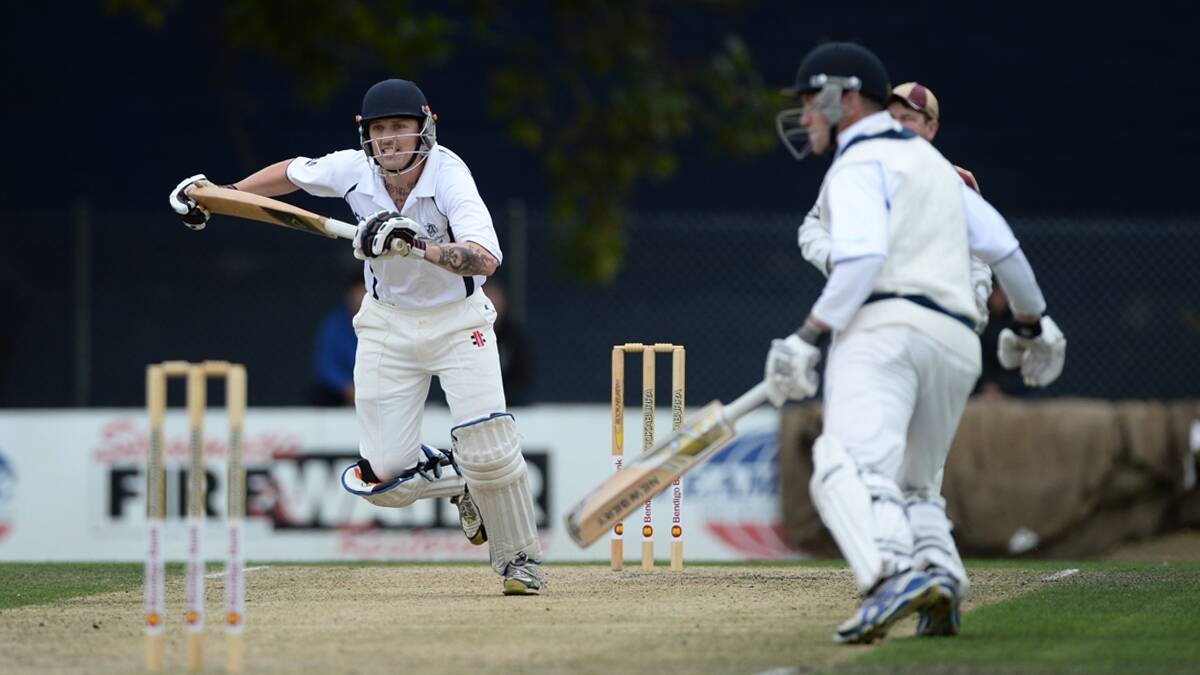 Mounties opener Les Sandwith runs hard to stay alive with wickets flying. Photo: Adam Trafford