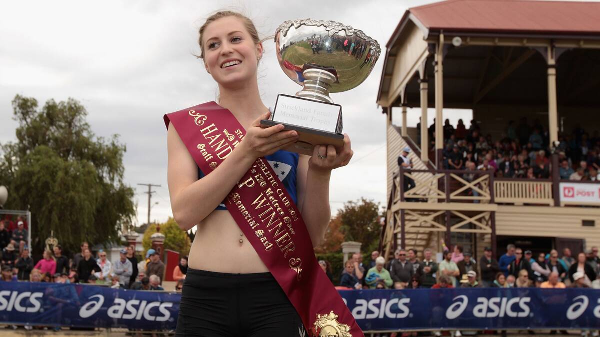 Ballarat's Holly Dobbyn with her prize as Women's Gift winner last Easter. Photo: Getty Images.
