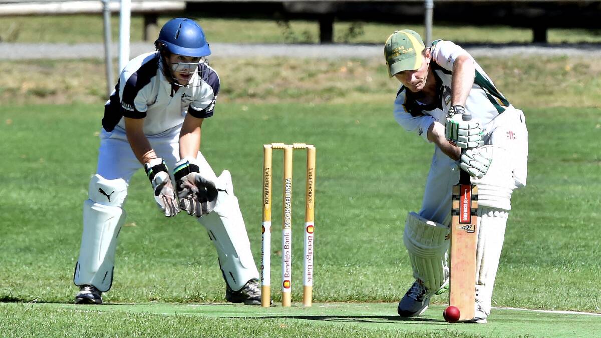 Ballan skipper and wicketkeeper Mick Nolan keeps close check on Lucas' Jake Pring. Photo: Jeremy Bannister.