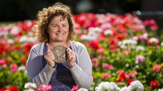 Closure: Jane Tito with her great great uncle's World War I medal, found in a garden in Australia. Photo: ALDEN WILLIAMS/ Fairfax NZ.