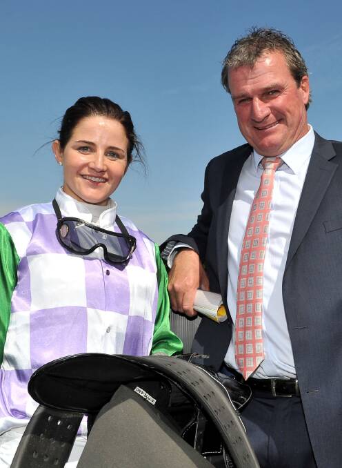 Jockey Michelle Payne with trainer Darren Weir on Saturday. Picture - Getty Images.