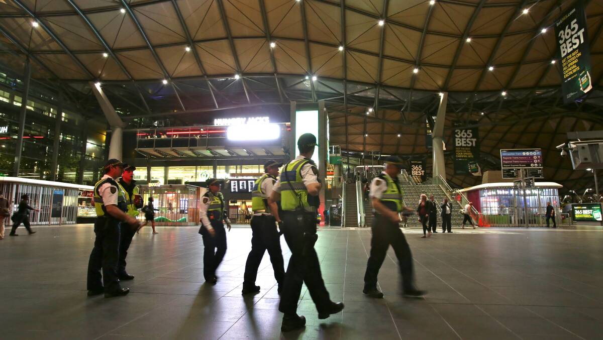 Protective Service Officers at Southern Cross Station. PICTURE: JUSTIN MCMANUS