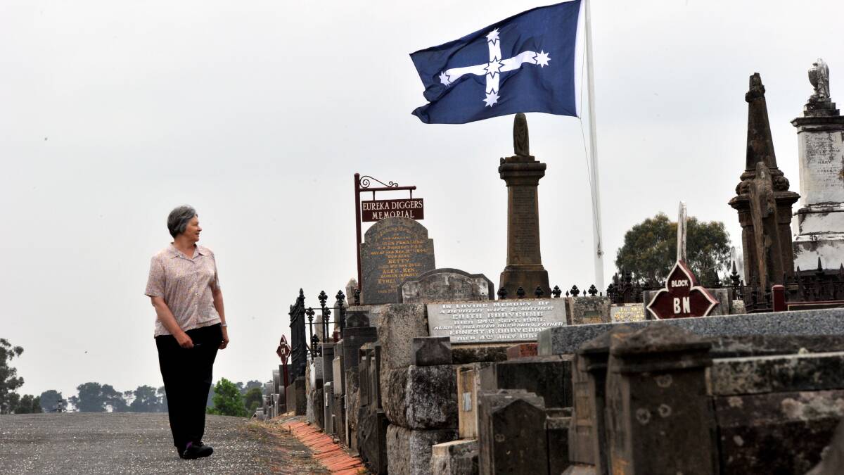 The genealogical society’s Neva Dunstan walks among the graves. PICTURE: JEREMY BANNISTER
