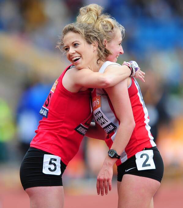 Training partners Heather Lewis, left, and Alana Barber embrace at the 2014 British Race Walking Championships. MAIN PICTURE: GETTY IMAGES