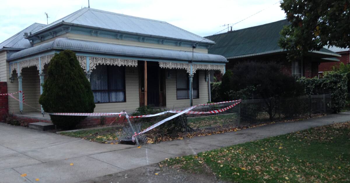 Damage to the front yard of a Ballarat home left by a single-car rollover on Friday night. PICTURE: DAVID JEANS