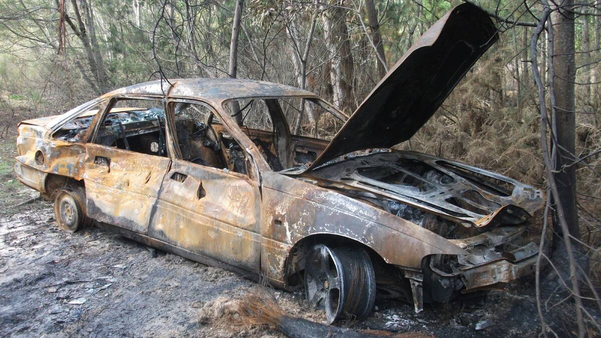 A car believed to be linked to the incident found burnt out near Whitehorse Road in Mt Clear. PICTURE: Victoria Police