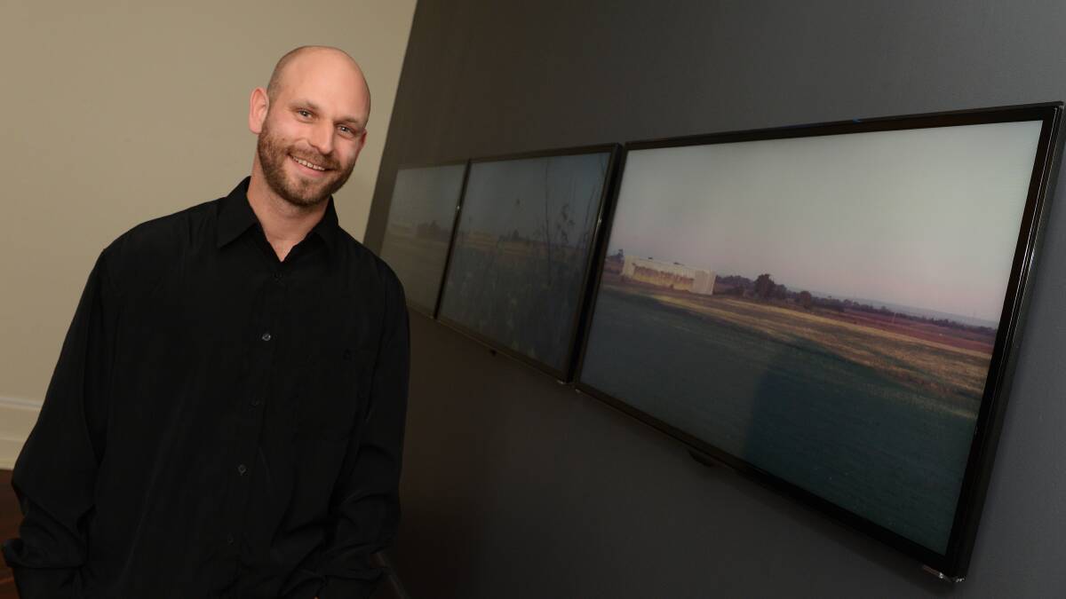 Winning artist Ash Keating with his work West Park Proposition in 2013. PICTURE: KATE HEALY.
