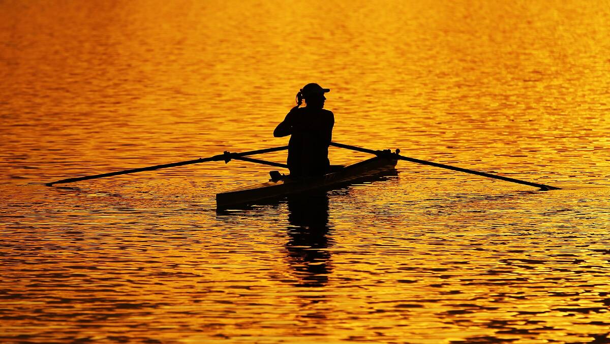 Kim Crow of Australia heads out for training early morning before the Rowing World Cup at the Sydney International Rowing Centre. Photo: Getty
