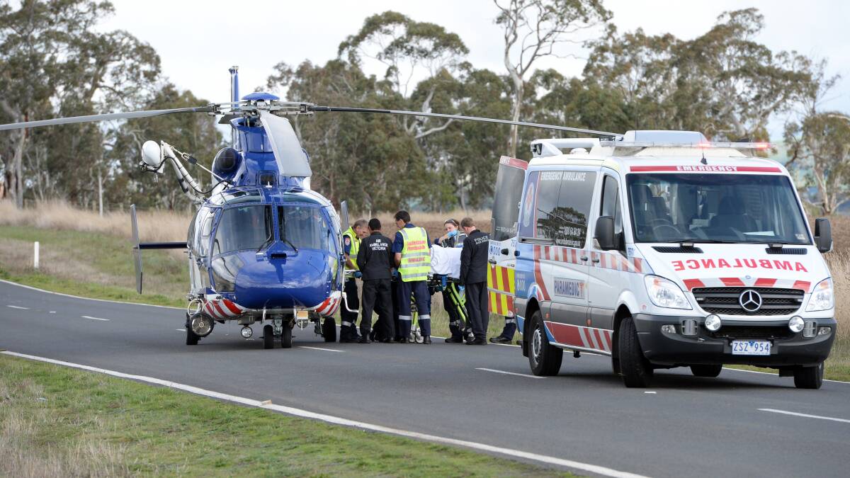 The air ambulance prepares to transport the injured man.