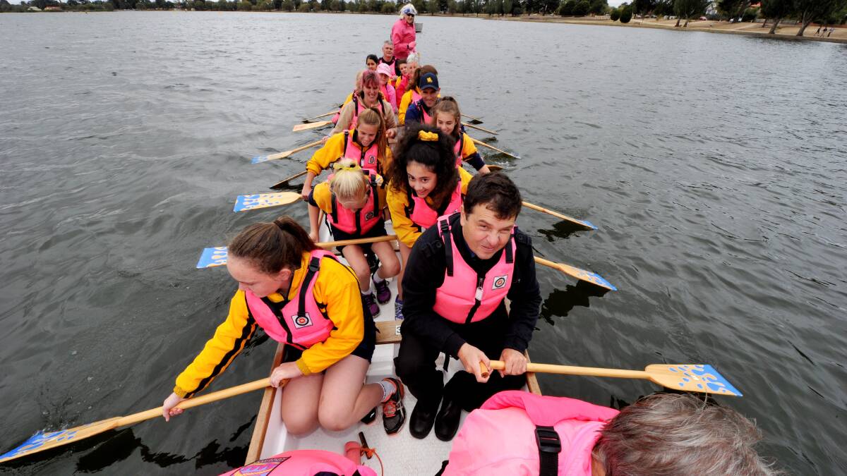 The Courier’s Gav McGrath hard at it on board the dragon boat. PICTURE: JEREMY BANNISTER