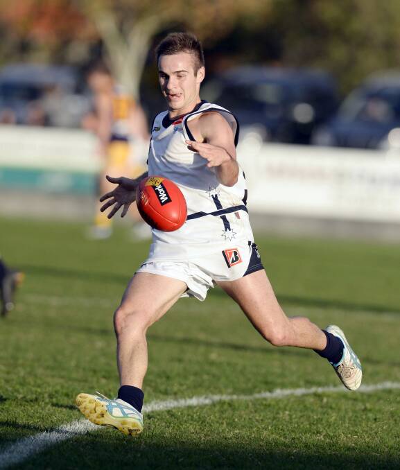 Chris Giampaolo sinks his boot into the ball for Ballarat. PICTURE: Ray Sizer, Shepparton News