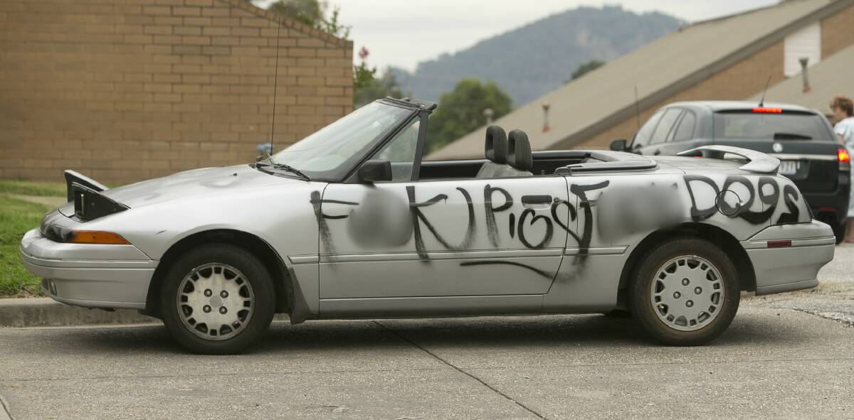 DUMPED: An edited image of the car with swear words blurred out. The vehicle was left at a McFarland Road housing estate. Picture: ELENOR TEDENBORG